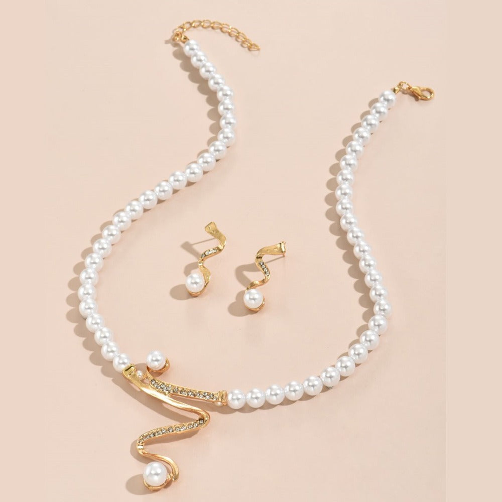 Conjunto de joyería nupcial con collar de perlas y diamantes: elegancia y gracia en uno